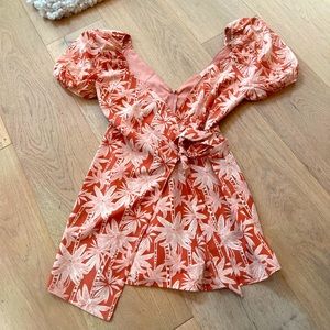 Blush floral wrap romper
